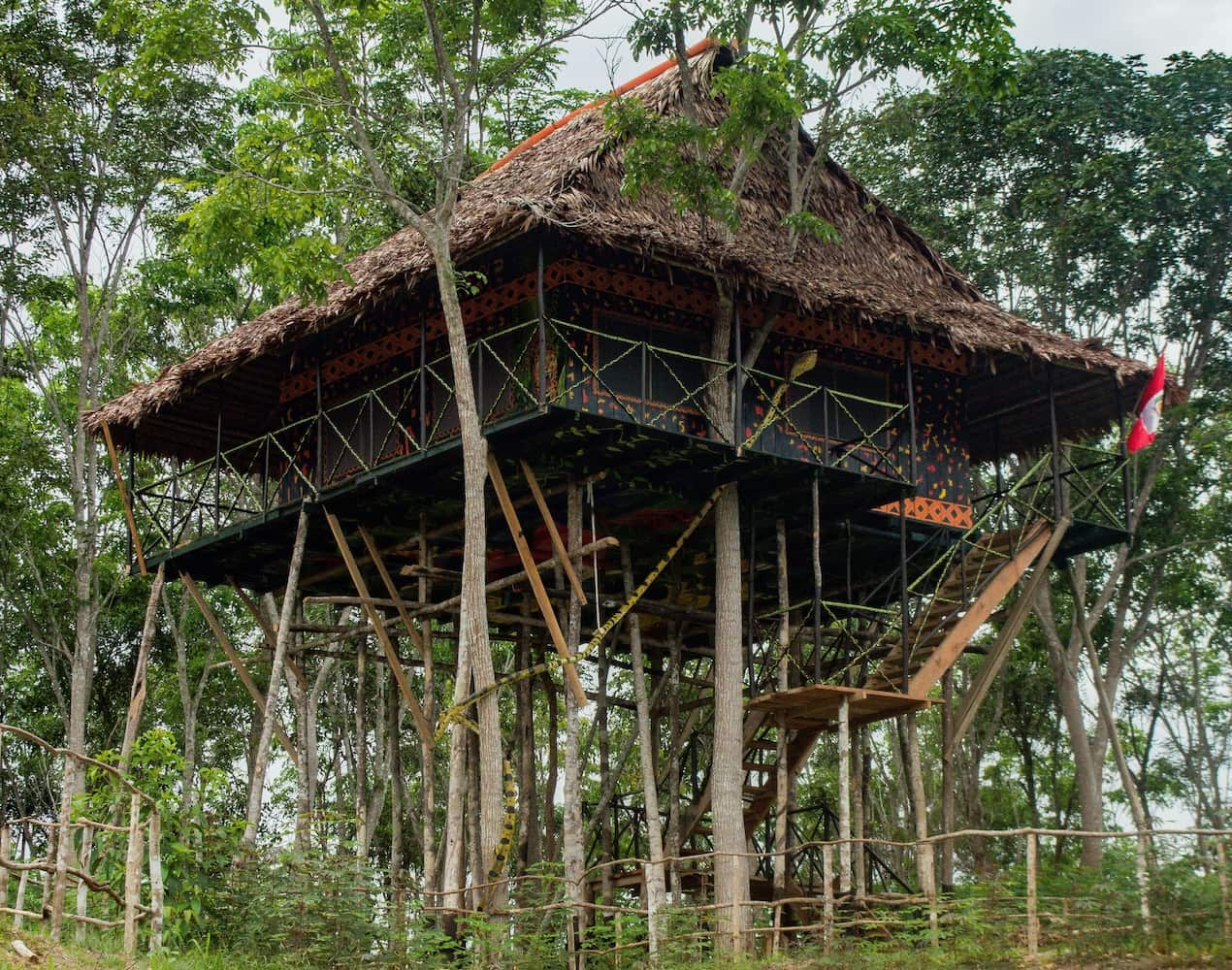 Elevated Amazon treehouse in Peru surrounded by dense forest — unique eco-lodge experience